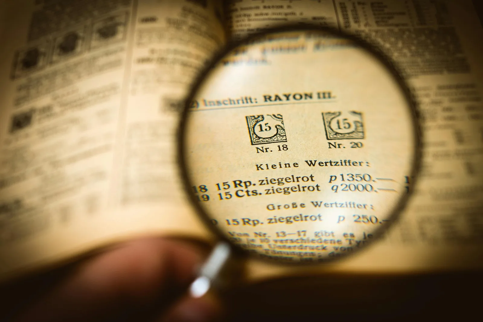 A magnifying glass examining figures on a page — scrutinising the DCF terminal value and the resulting enterprise value in a stock valuation